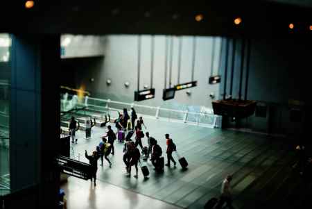 People Travelling at an Airport
